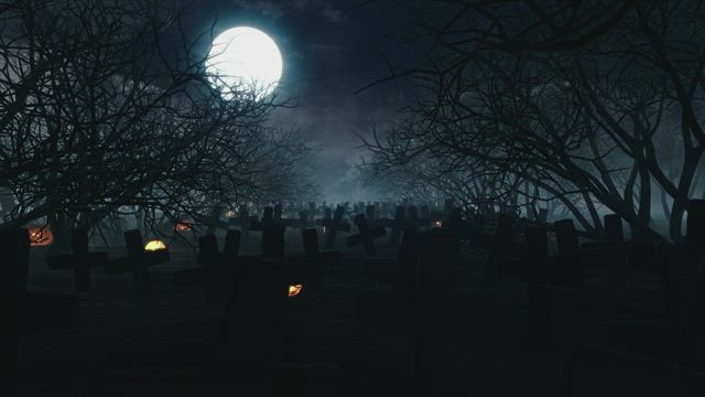 Dark and creepy graveyard full of crosses.