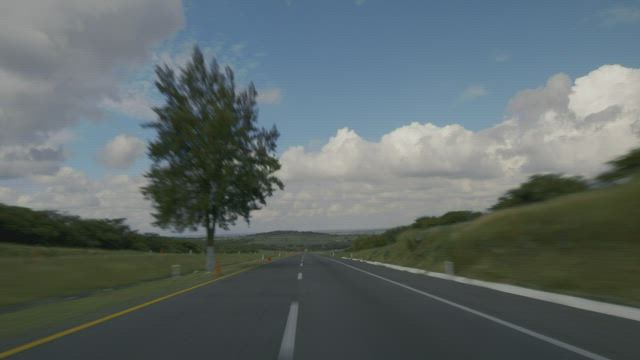 Speedy point-of-view tour of a highway.