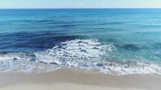 Waves coming to the beach.