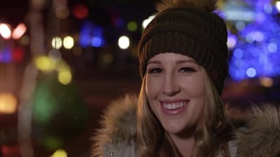 Young woman smiling and laughing.