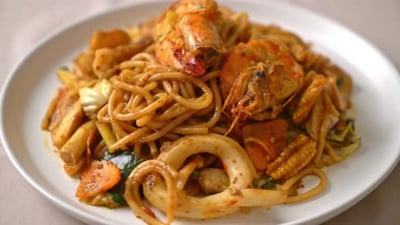 stir fried Tom Yum seafood dried spaghetti - Fusion food style.