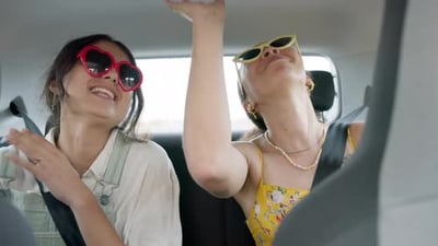 Car, singing and happy friends on a road trip, excited adventure and holiday with transport.